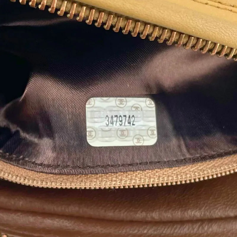 jw564-chanel-vintage-beige-lambskin-tassel-camera-bag