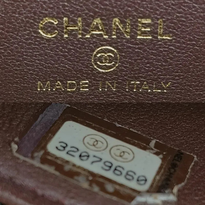 ra340-chanel-black-lambskin-mini-vanity-case-bag