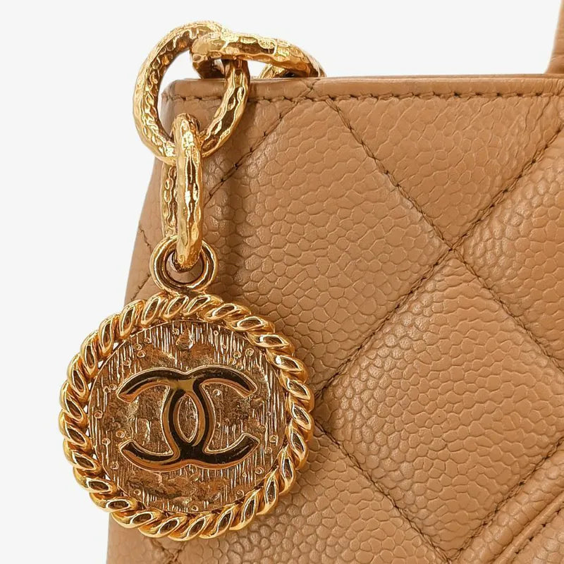 jt585-chanel-vintage-beige-caviar-leather-1804-tote-bag