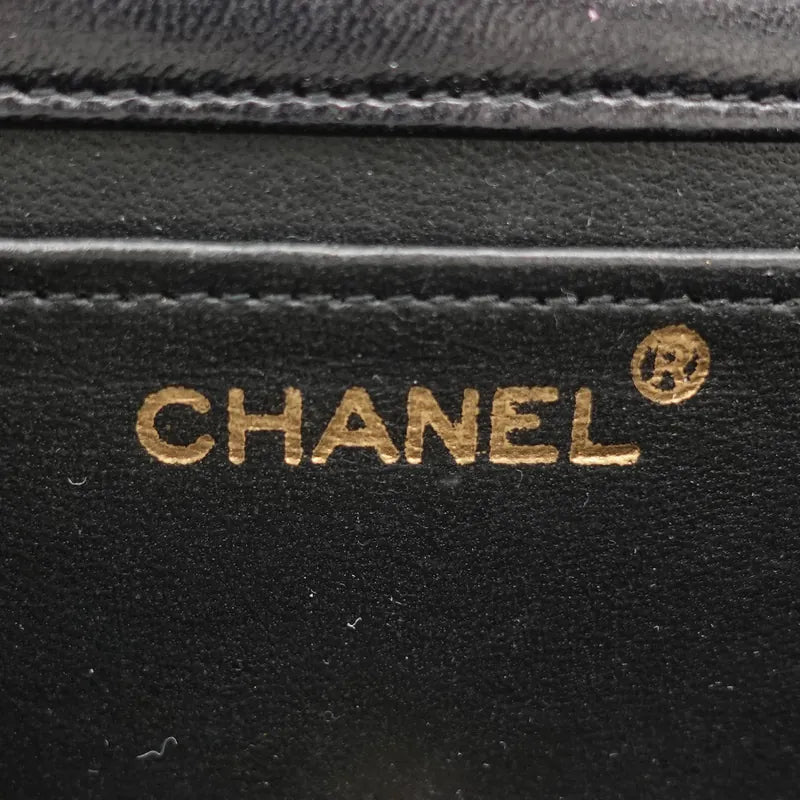 jq470-chanel-vintage-black-lizard-skin-flap-bag