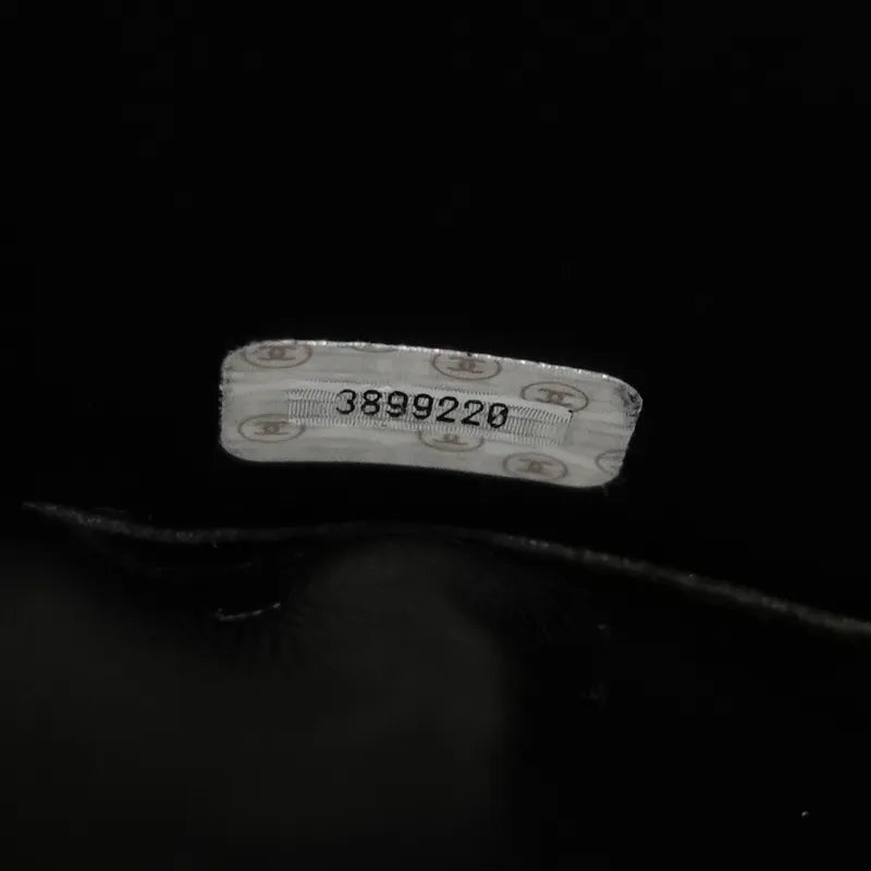 jq582-chanel-vintage-black-caviar-embossed-logo-cosmetic-bag