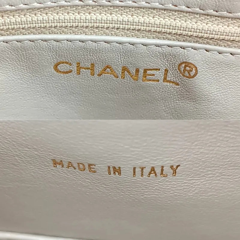 js705-chanel-vintage-beige-caviar-leather-quilted-camera-bag