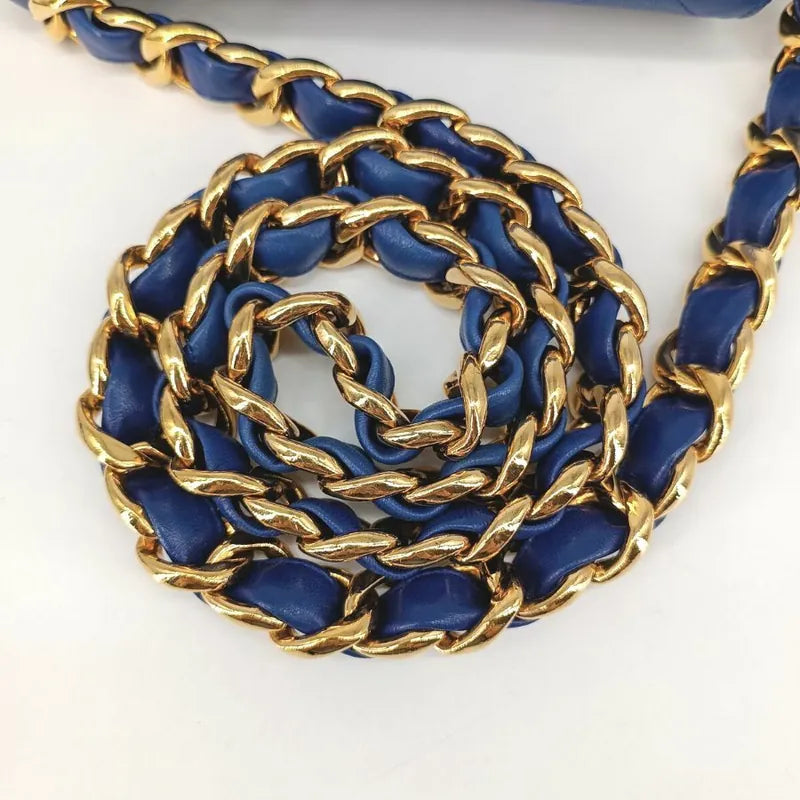 90201290-chanel-vintage-blue-lambskin-flap-bag