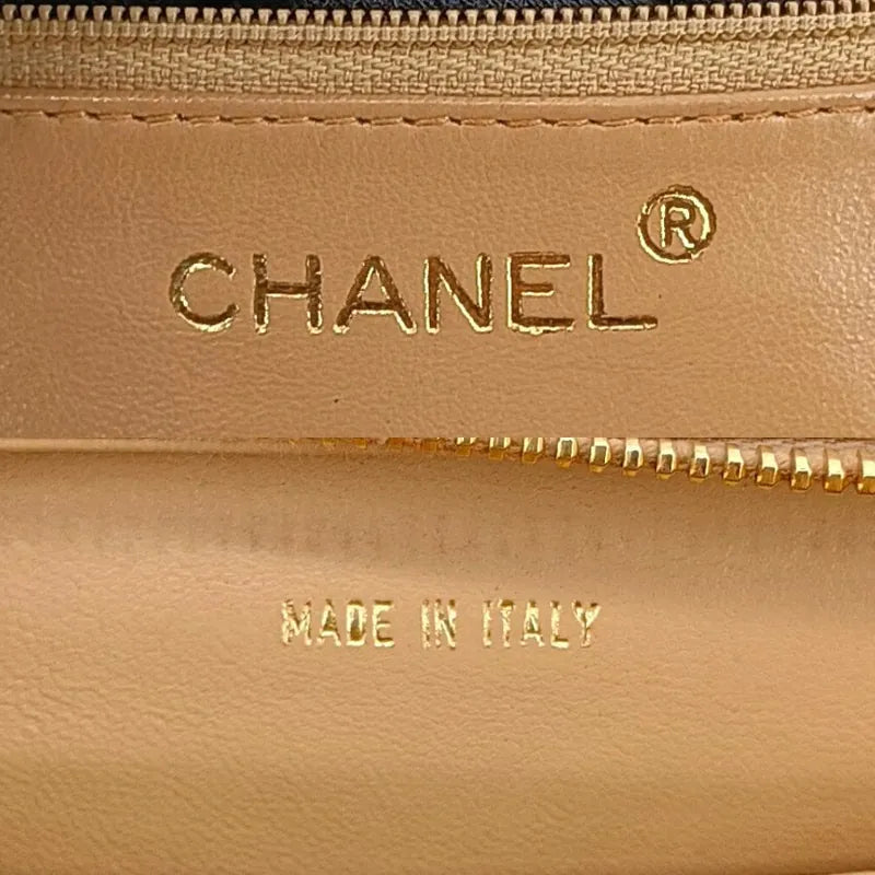 ra491-chanel-vintage-beige-lambskin-quilted-handbag