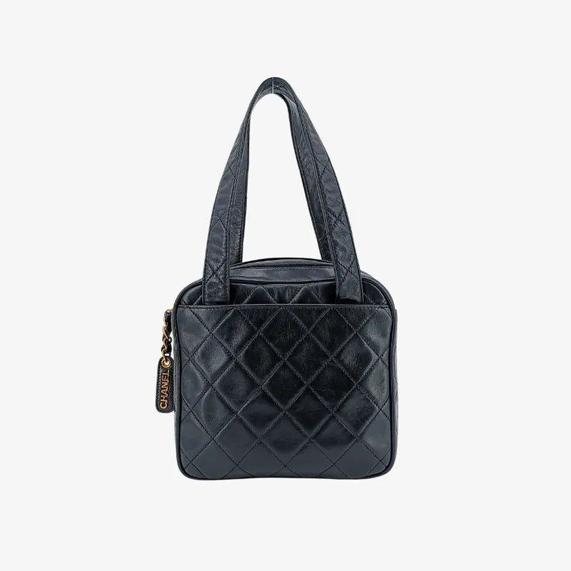 ju691-chanel-vintage-black-lambskin-quilted-handbag