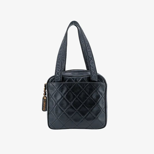 ju691-chanel-vintage-black-lambskin-quilted-handbag