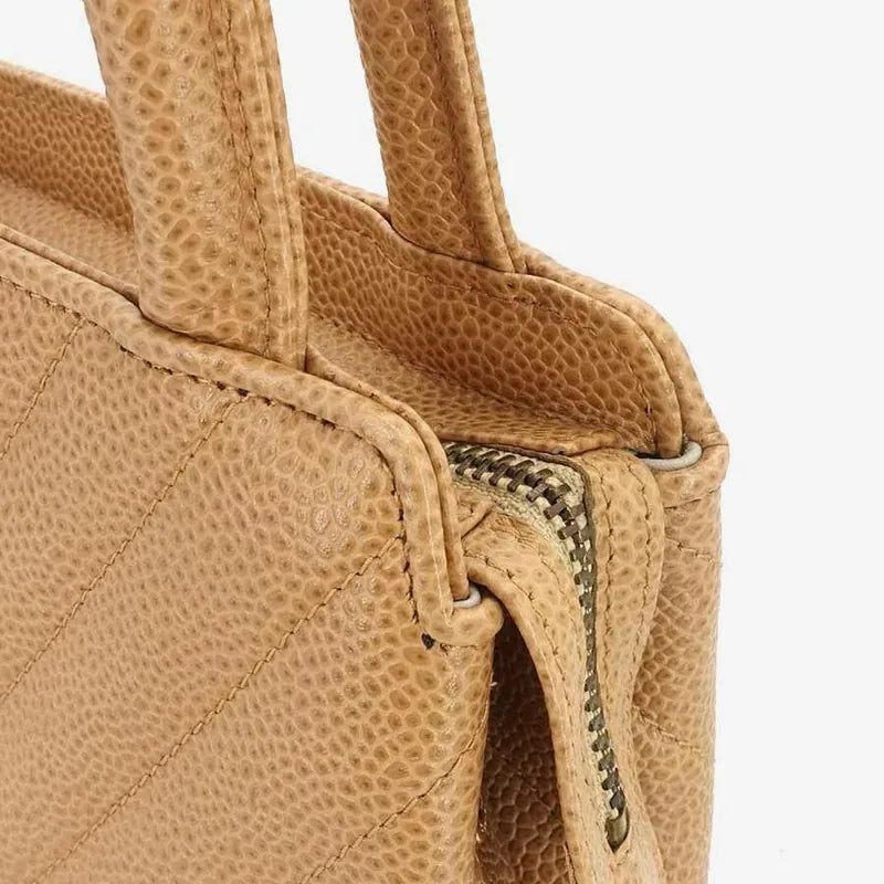 jr876-chanel-vintage-beige-caviar-leather-handbag