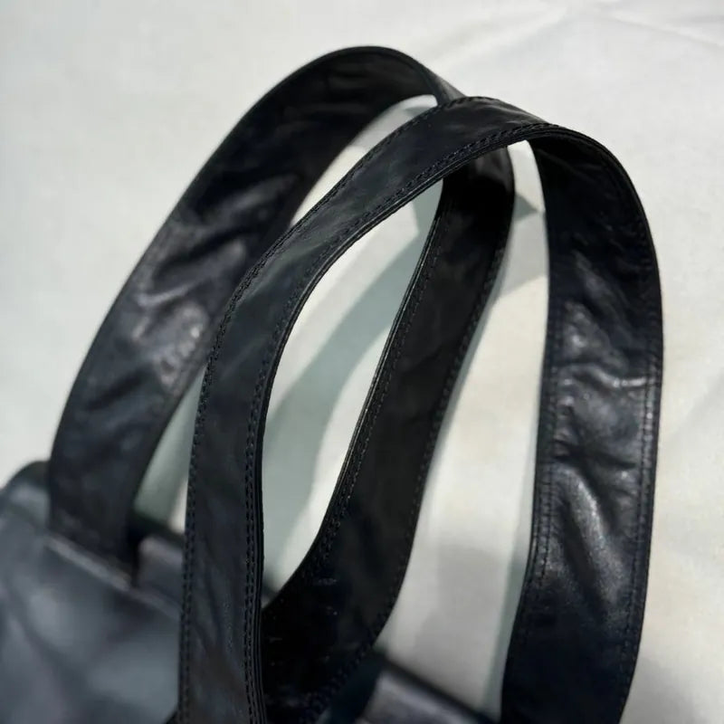 jx064-chanel-vintage-black-lambskin-backpack