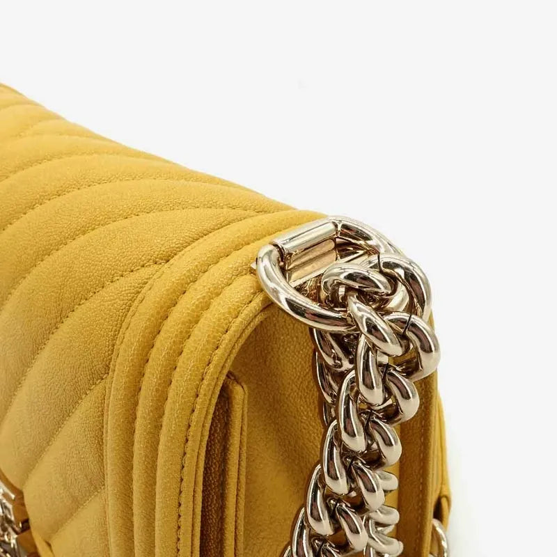 c226-chanel-boy-yellow-caviar-leather-flap-bag