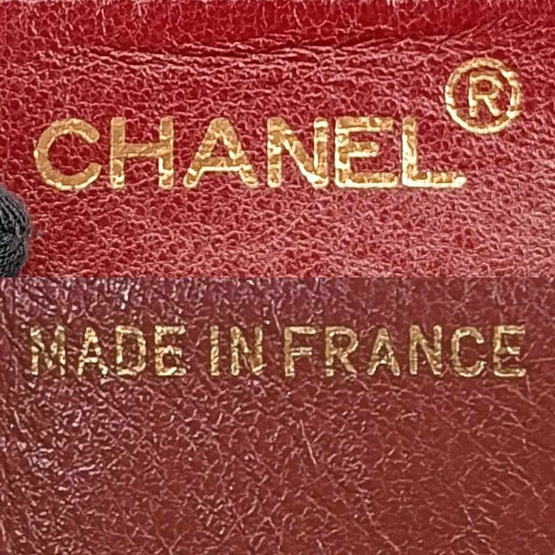 c407-chanel-vintage-navy-lambskin-chevron-mini-flap-bag