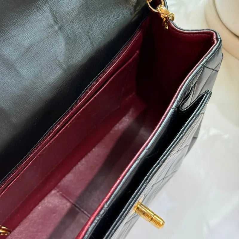 rc658-chanel-vintage-black-lambskin-gold-chain-flap-bag