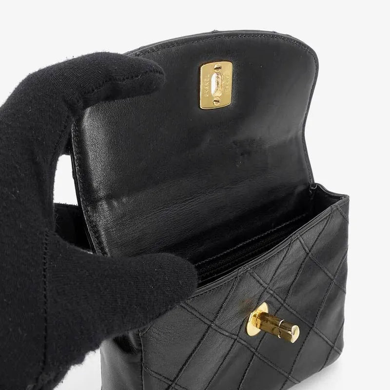 js005-chanel-vintage-black-lambskin-quilted-belt-bag