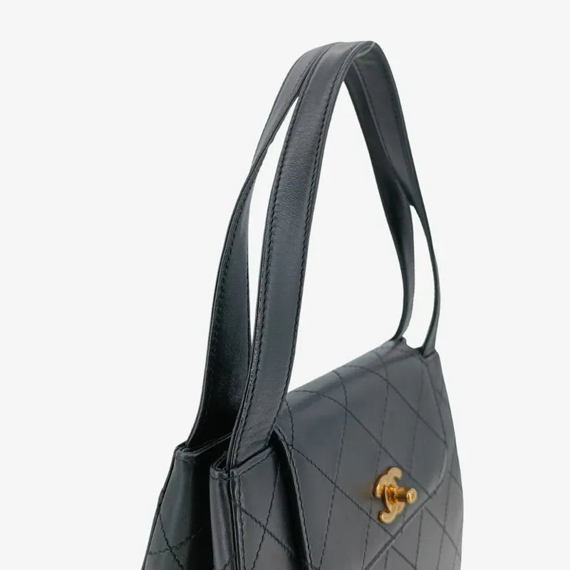 ra555-chanel-vintage-black-lambskin-quilted-handbag