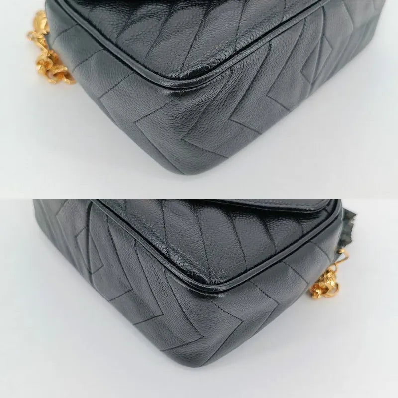 ju669-chanel-vintage-black-caviar-leather-gold-chain-chevron-camera-bag