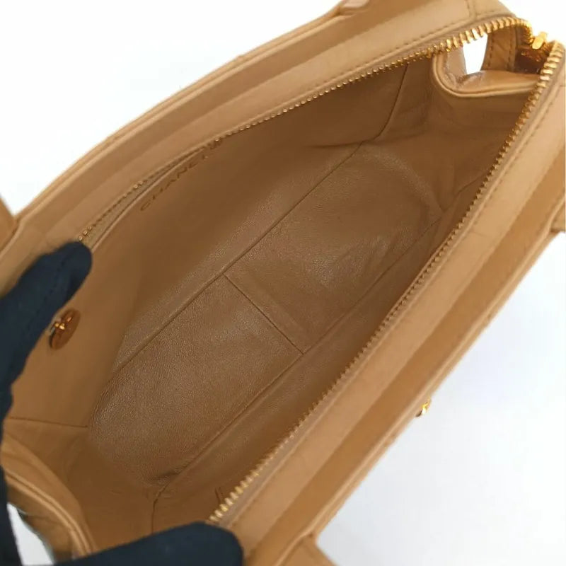 ra491-chanel-vintage-beige-lambskin-quilted-handbag