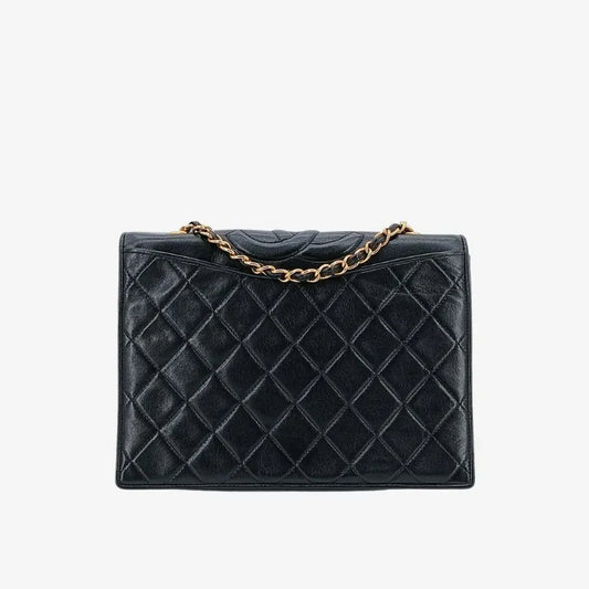 ju424-chanel-vintage-black-lambskin-quilted-flap-bag