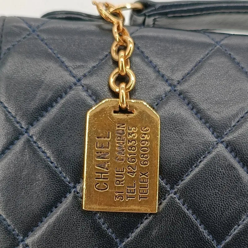 ra489-chanel-vintage-navy-lambskin-double-turnlock-flap-bag