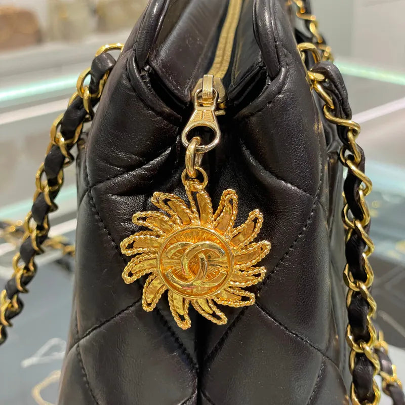 rc178-chanel-vintage-black-lambskin-sun-flower-charm-tote-bag