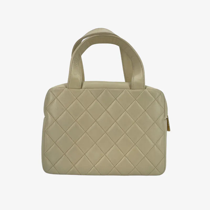jy462-chanel-vintage-beige-lambskin-quilted-handbag