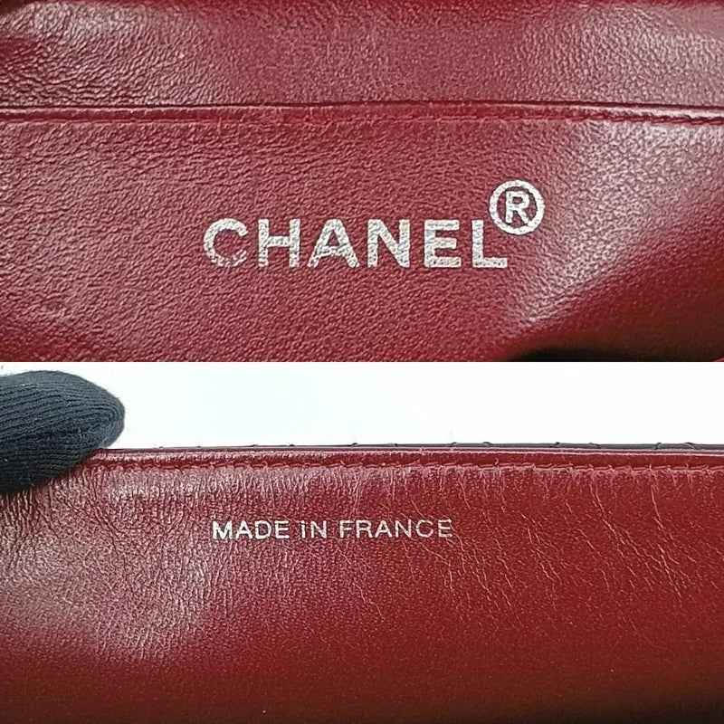 90201267-chanel-vintage-black-lambskin-quilted-flap-bag