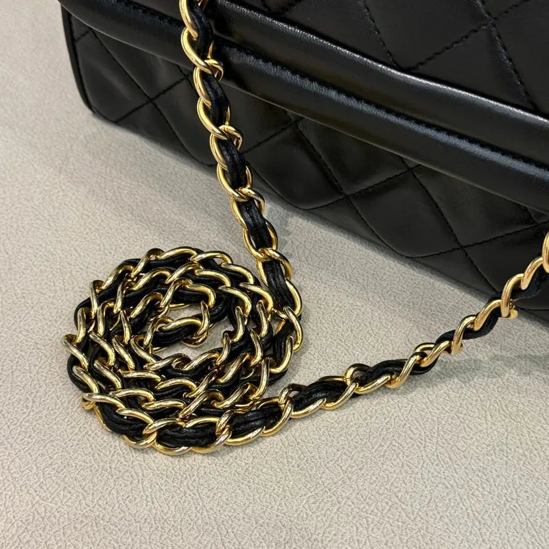 rc721-chanel-vintage-black-lambskin-quilted-flap-bag