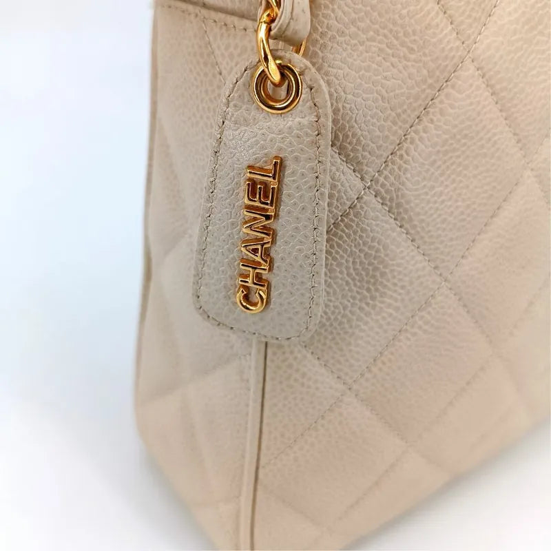 js705-chanel-vintage-beige-caviar-leather-quilted-camera-bag