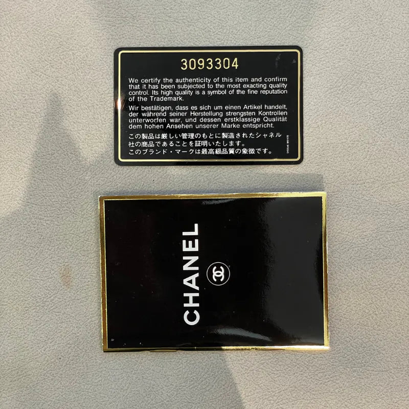 rc178-chanel-vintage-black-lambskin-sun-flower-charm-tote-bag