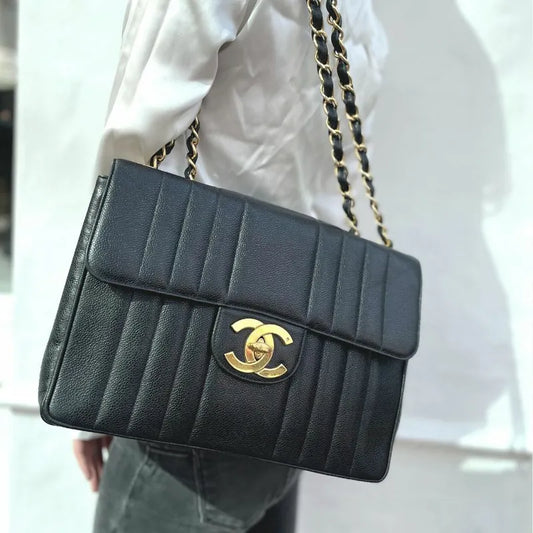 c377-chanel-vintage-black-caviar-leather-vertical-jumbo-flap-bag