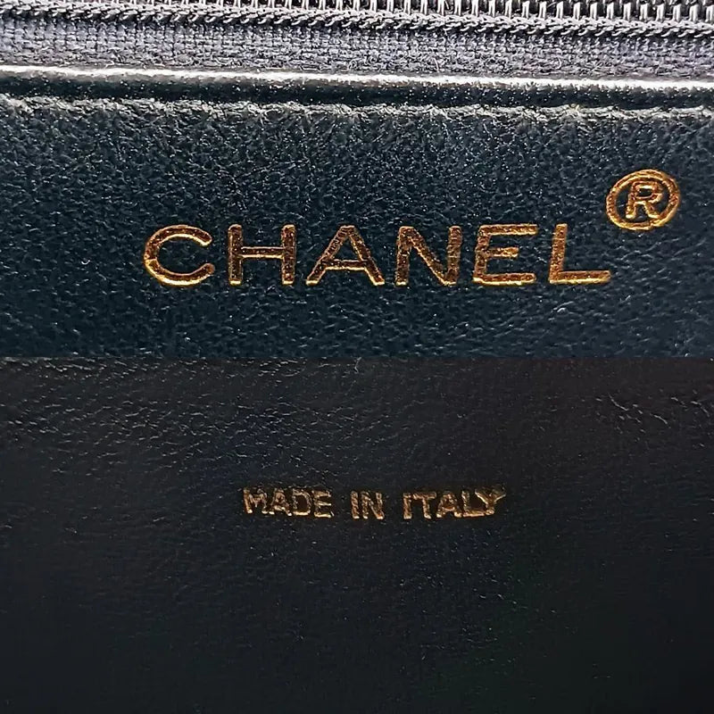 c320-chanel-vintage-black-patent-leather-quilted-flap-bag