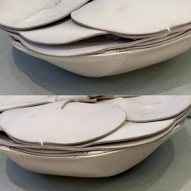 c531-chanel-vintage-pale-pink-calfskin-camellia-wristlet-evening-bag