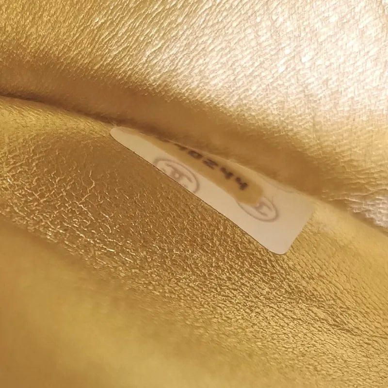 c386-chanel-vintage-gold-lambskin-quilted-handbag