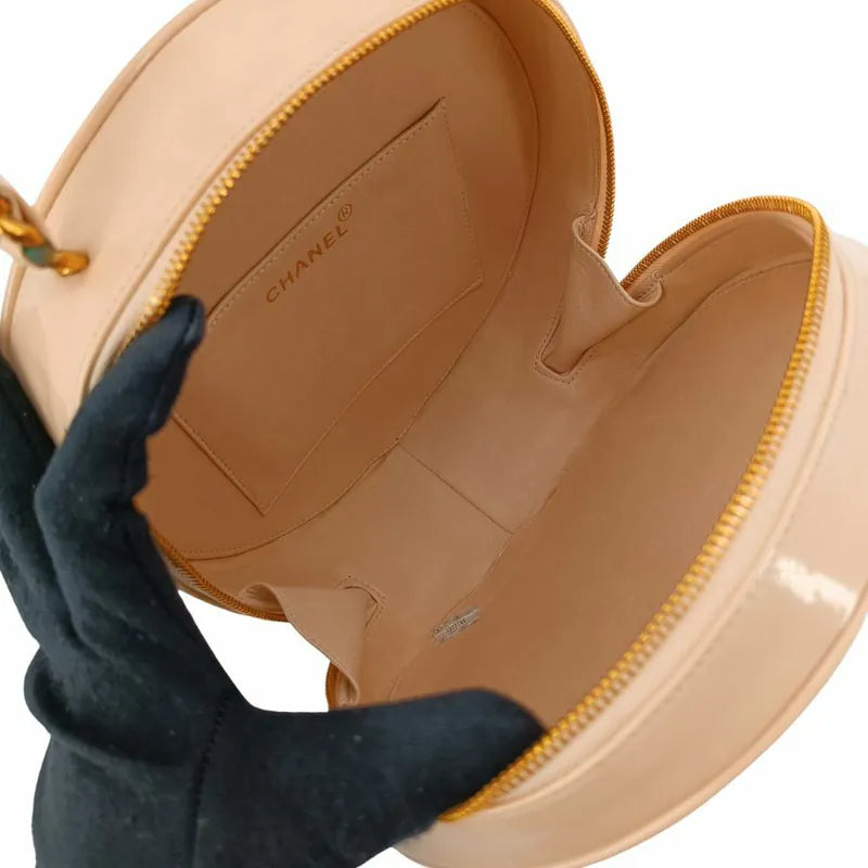 sh022-chanel-vintage-beige-patent-leather-round-vanity-handbag