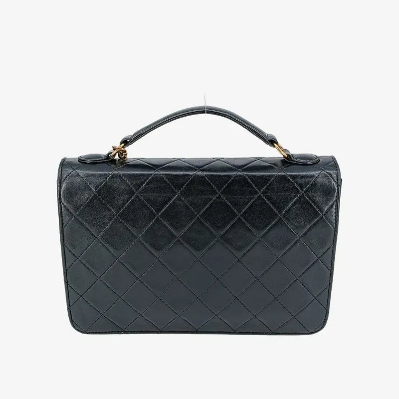 jah83-chanel-vintage-black-lambskin-double-turnlock-flap-bag