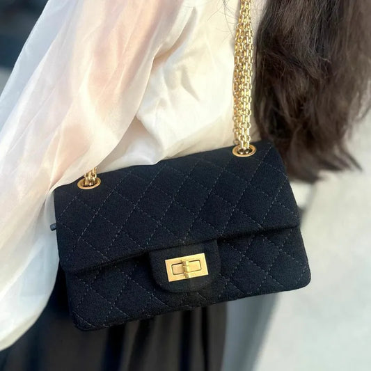 90208130-chanel-vintage-black-cotton-255-flap-bag