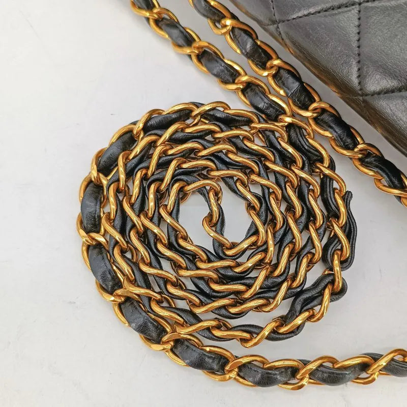 jah169-chanel-vintage-black-lambskin-jumbo-classic-flap-bag