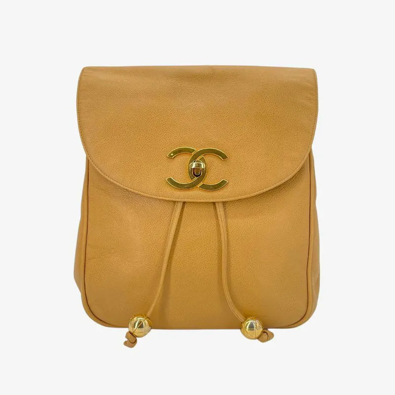 rc295-chanel-vintage-beige-caviar-leather-turnlock-flap-backpack