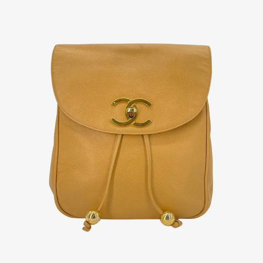 rc295-chanel-vintage-beige-caviar-leather-turnlock-flap-backpack