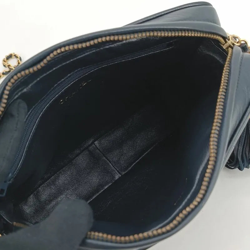 jt267-chanel-vintage-navy-lambskin-tassel-camera-bag
