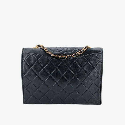 ju424-chanel-vintage-black-lambskin-quilted-flap-bag