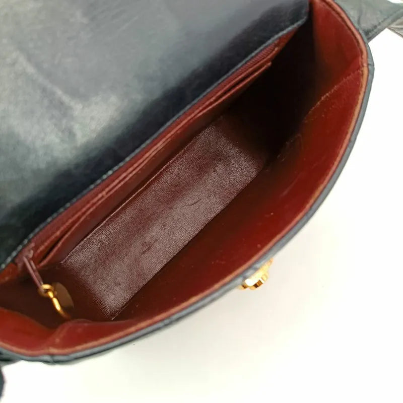 c316-chanel-vintage-black-lambskin-push-lock-flap-bag