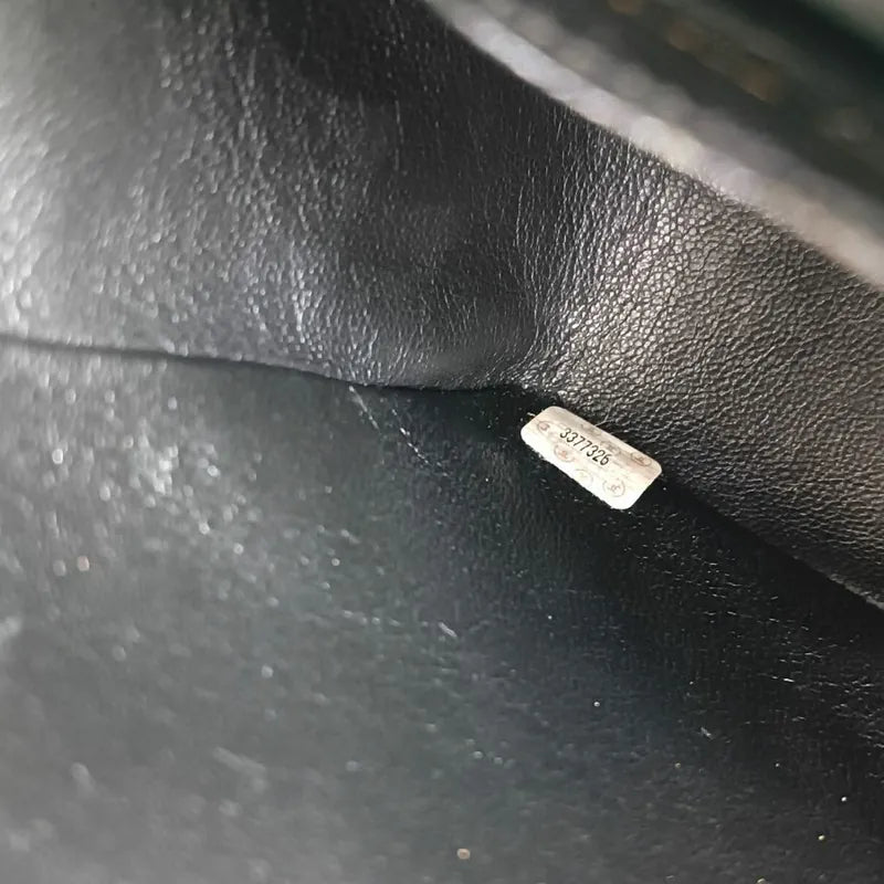 c361-chanel-vintage-black-caviar-leather-vertical-flap-handbag