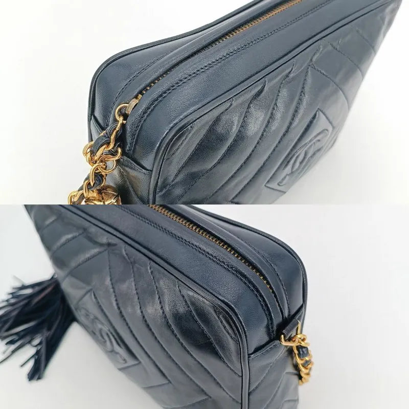 jt267-chanel-vintage-navy-lambskin-tassel-camera-bag