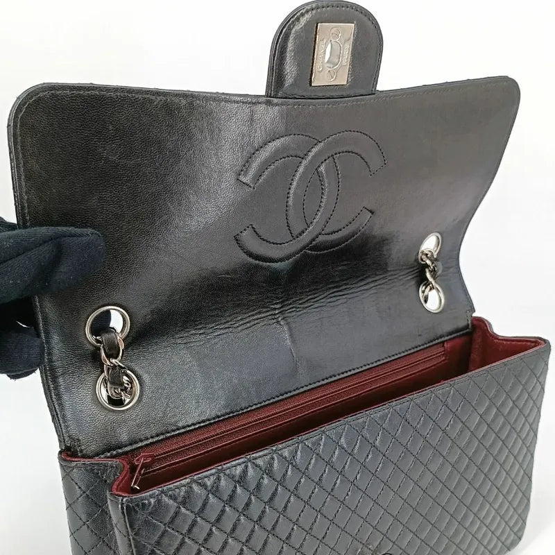 90201267-chanel-vintage-black-lambskin-quilted-flap-bag