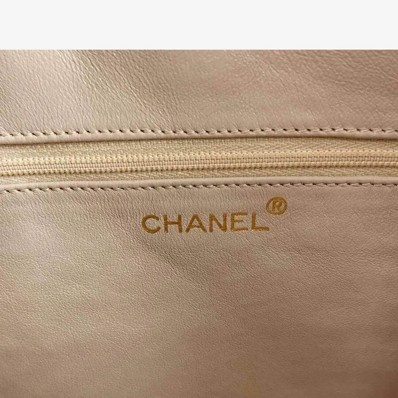 js006-chanel-vintage-beige-lambskin-quilted-camera-bag