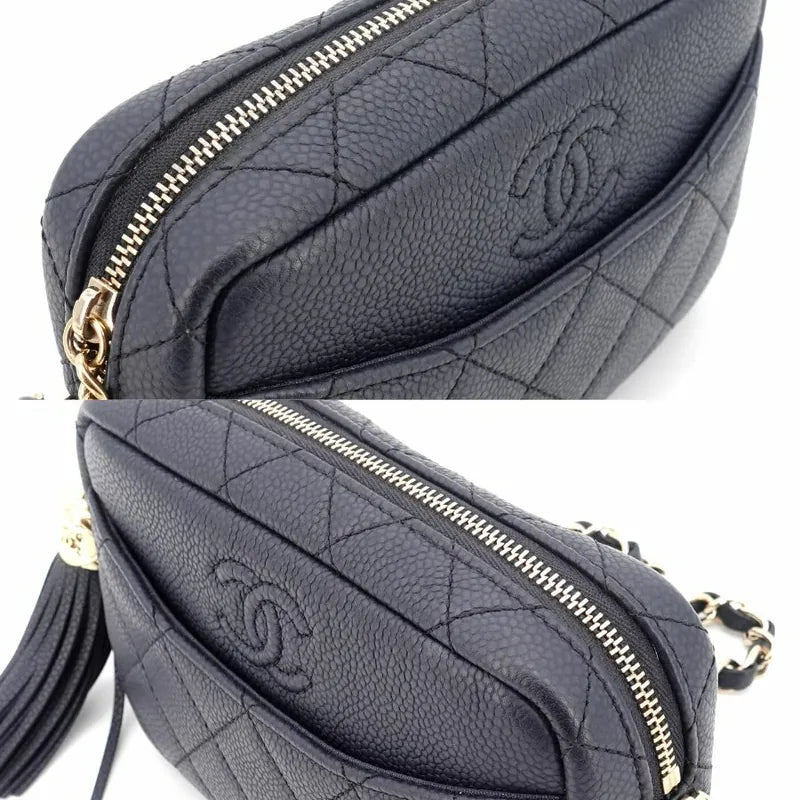 c325-chanel-navy-caviar-leather-camera-bag