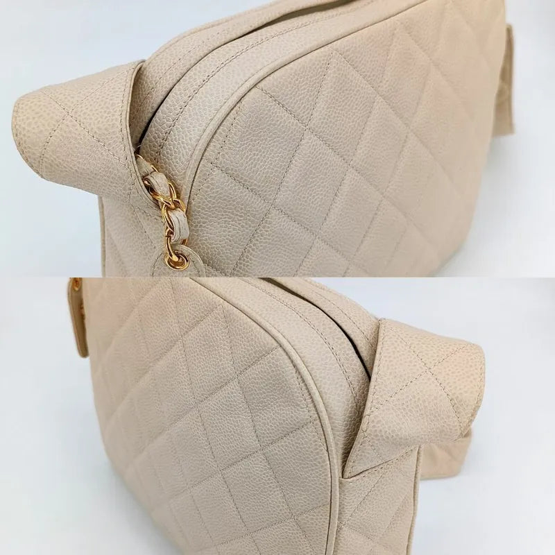 js705-chanel-vintage-beige-caviar-leather-quilted-camera-bag