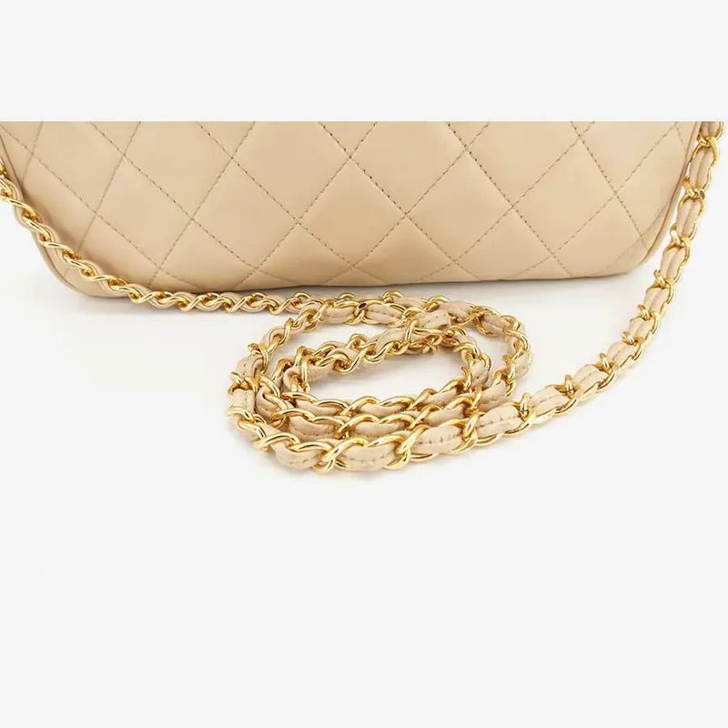 js006-chanel-vintage-beige-lambskin-quilted-camera-bag