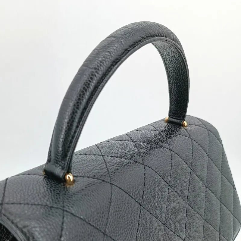 c401-chanel-vintage-black-caviar-leather-kelly-handbag