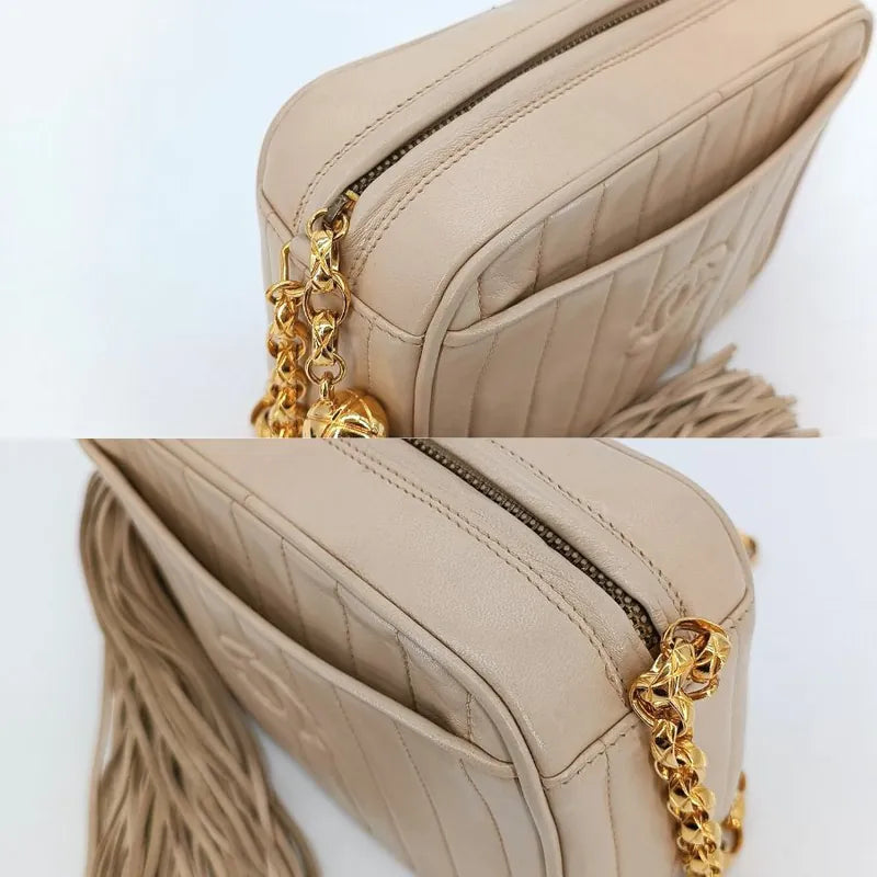jt248-chanel-vintage-beige-lambskin-tassels-gold-chain-camera-bag