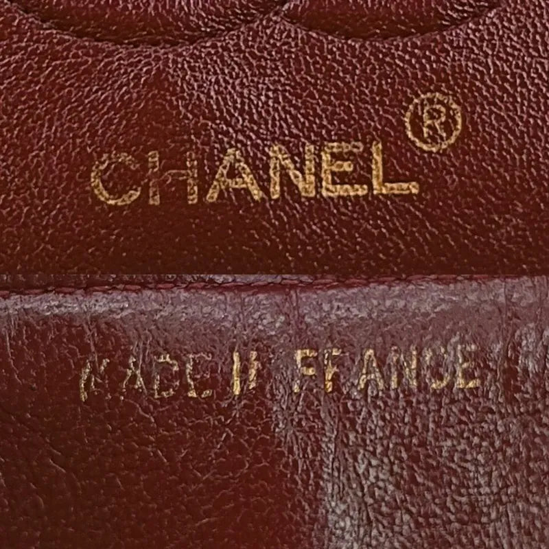 ju235-chanel-vintage-black-lambskin-23cm-classic-flap-bag